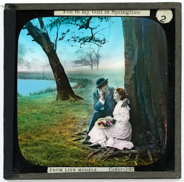 2. 'Neath an old oak tree sit a youthful loving pair