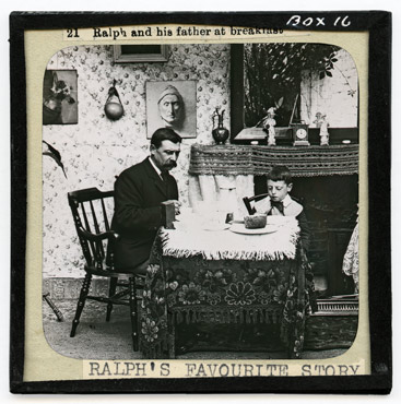 21. Ralph and his father at breakfast